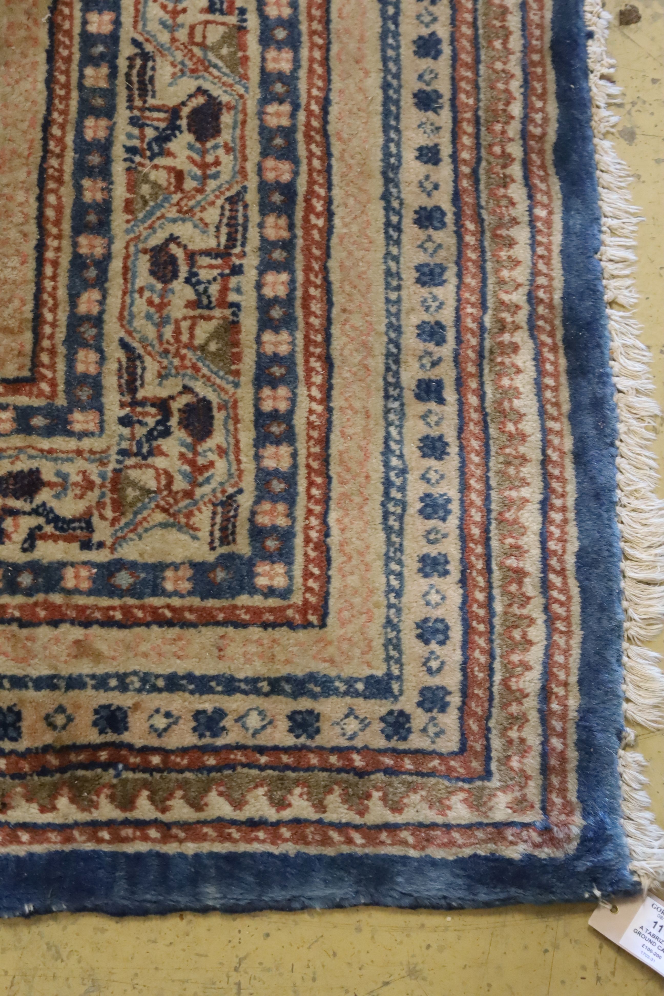 A Tabriz blue ground carpet